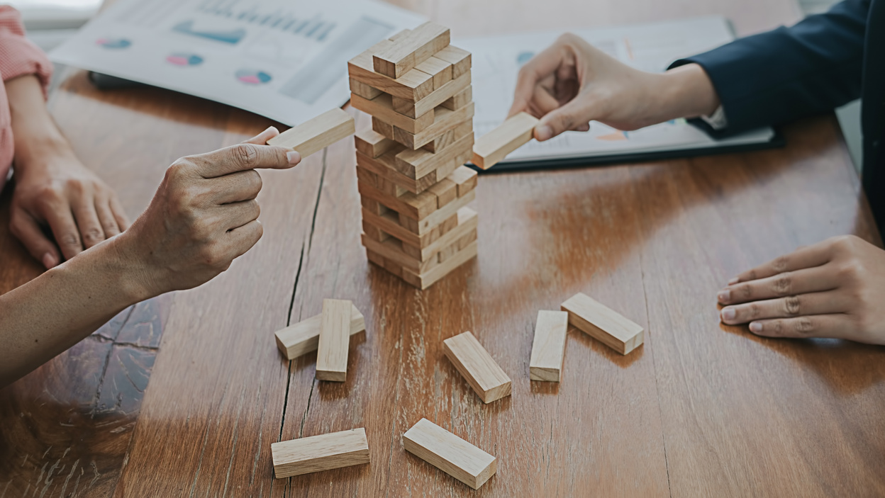 Business Colleagues Playing Jengga Blocks